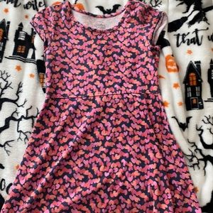 This is a dress with hearts on it, It has no stains or holes and good quality.